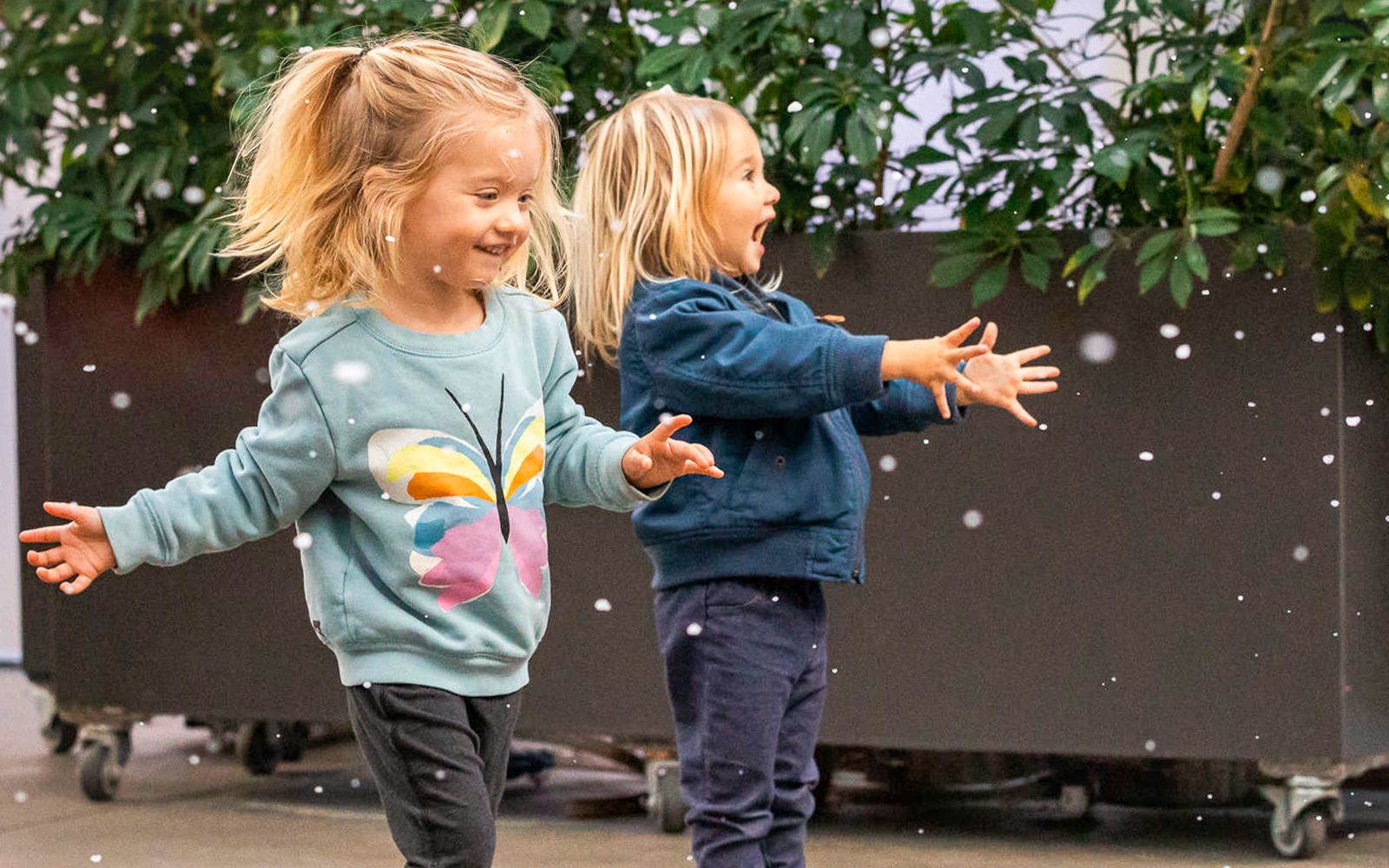 Children playing with bubbles at California Academy of Sciences.
