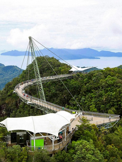 Langkawi Skybridge spanning lush forests with distant islands in view.