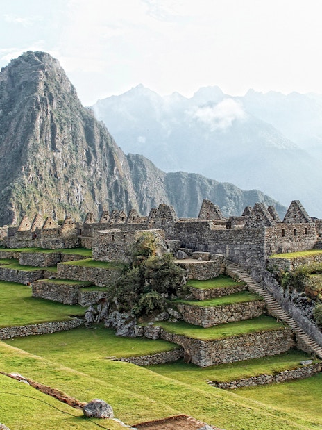 Machu Picchu ruins with Huayna Picchu mountain in the background, Peru.