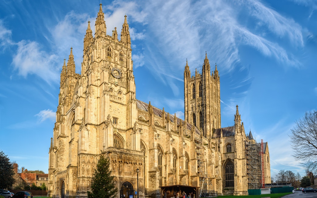 Canterbury Cathedral under a blue sky, part of the Canterbury and Dover Guided Day Tour from London.