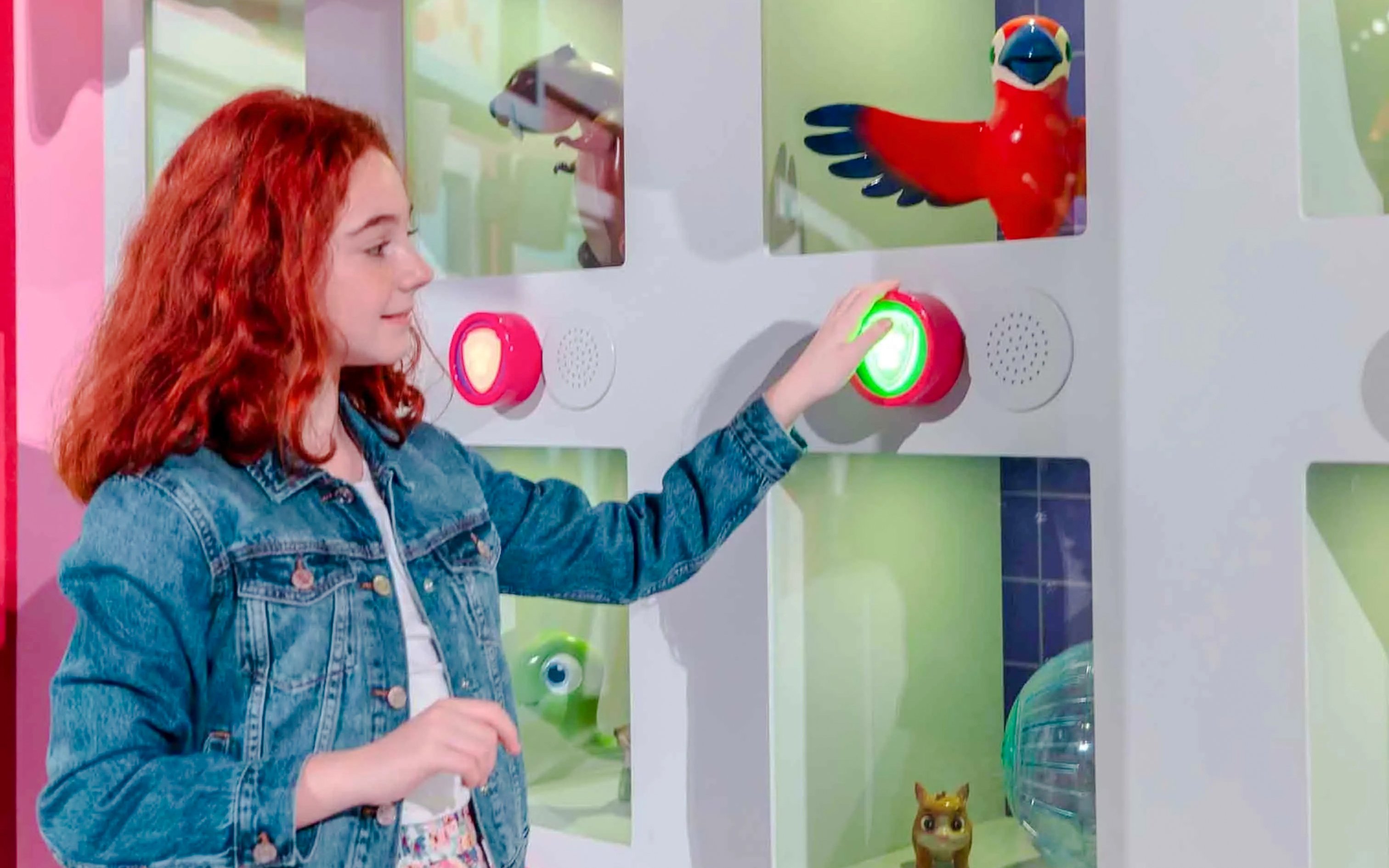 Guest interacting with a game at Nickelodeon Play City, Istanbul.