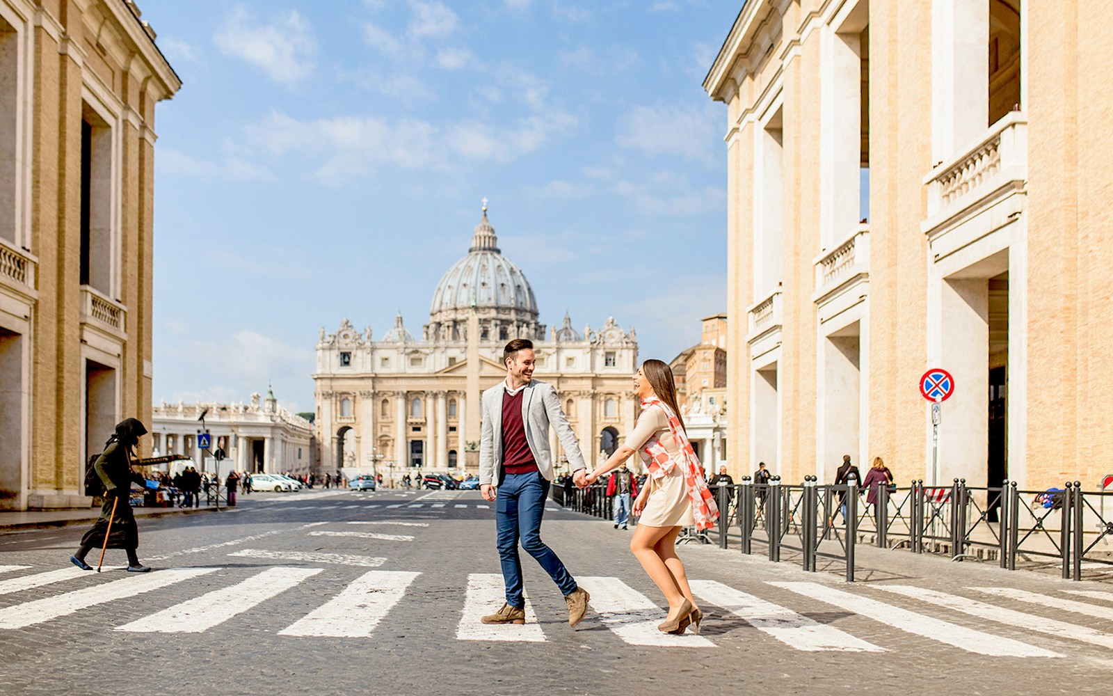Couple enjoying a scenic view of the Colosseum in Rome.