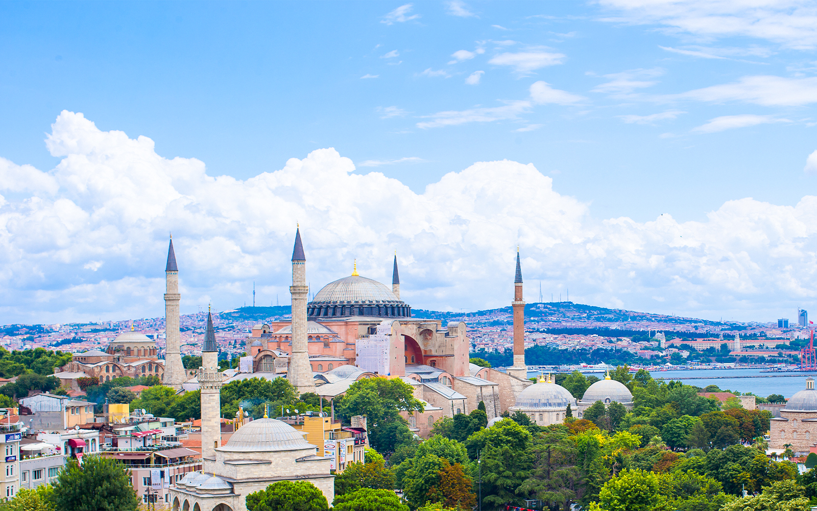 Hagia Sophia view from hotel terrace in Istanbul, Turkey with cityscape in background.