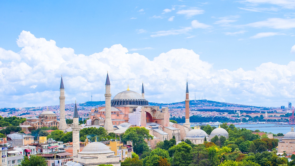 Hagia Sophia view from Istanbul hotel terrace with cityscape in background.