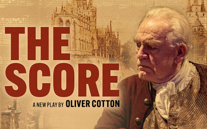 The Score" play poster featuring a historical figure in period costume with cathedral backdrop.