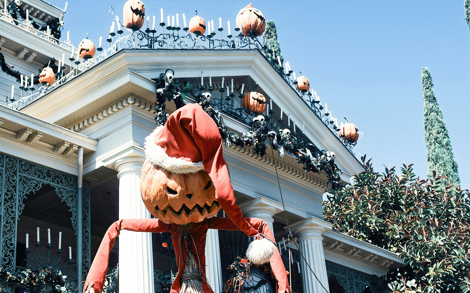 Haunted Mansion with Halloween decorations, Disneyland, California.