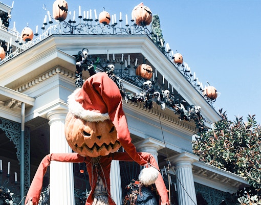 Haunted Mansion with Halloween decorations, Disneyland, California.