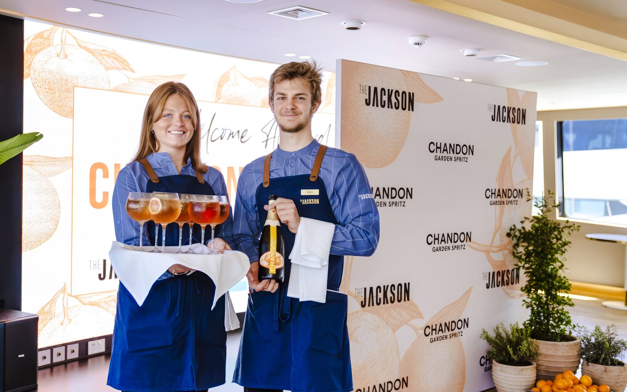 Servers presenting drinks and Chandon bottle on The Jackson for Chandon Harbour Long Lunch.
