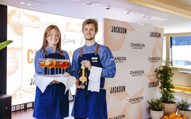 Servers presenting drinks and Chandon bottle on The Jackson for Chandon Harbour Long Lunch.