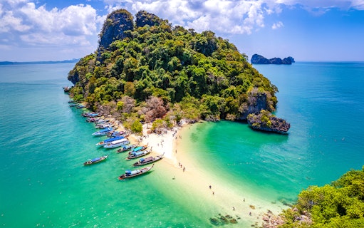 Pak Bia Beach with boats and tourists, Hong Islands, Krabi.