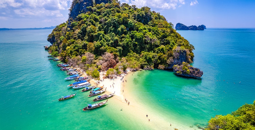 Pak Bia Beach with boats and tourists, Hong Islands, Krabi.