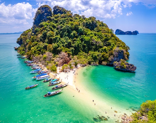 Pak Bia Beach with boats and tourists, Hong Islands, Krabi.