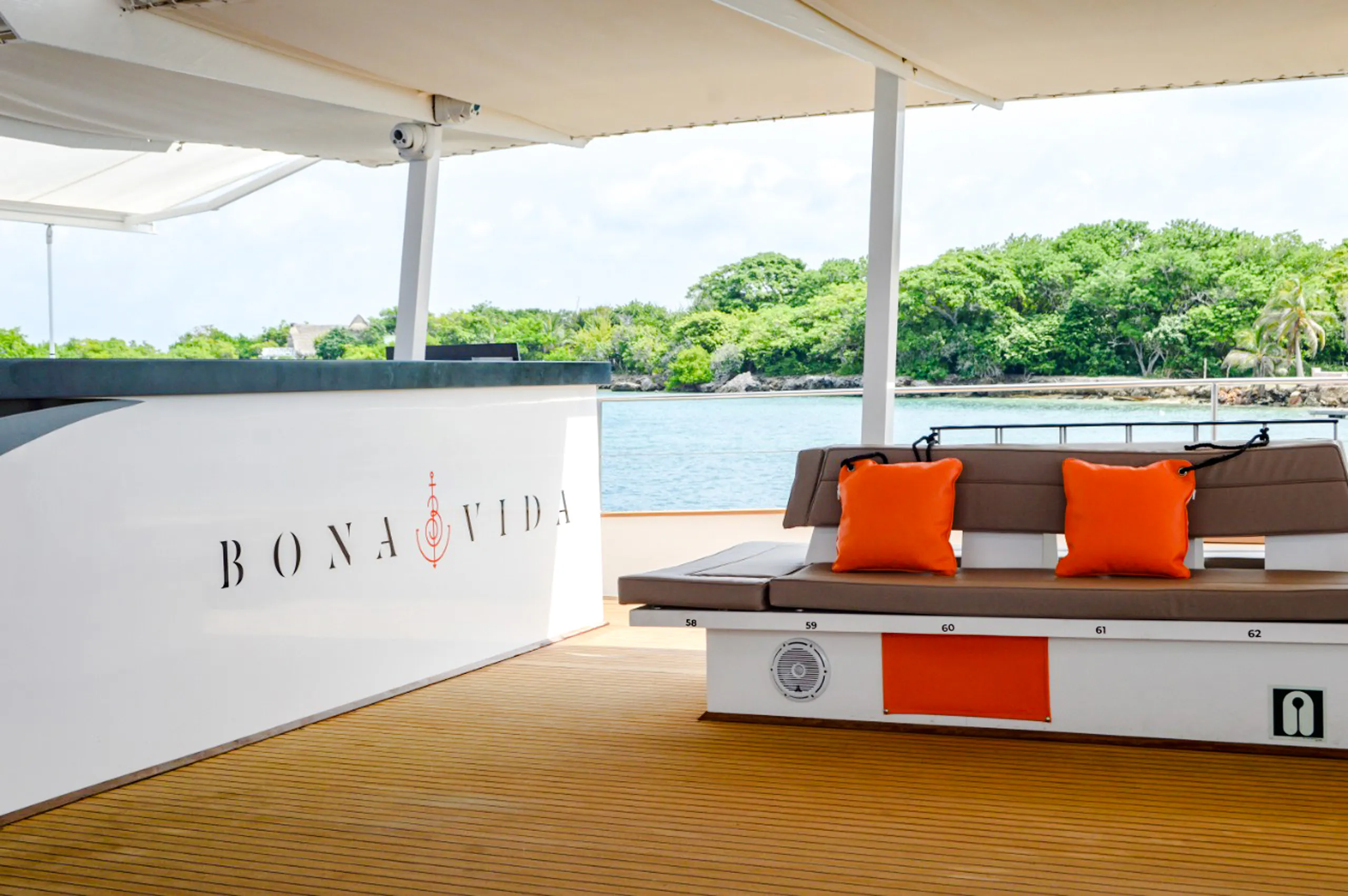 Catamaran deck with bar and seating, Cartagena sunset tour.