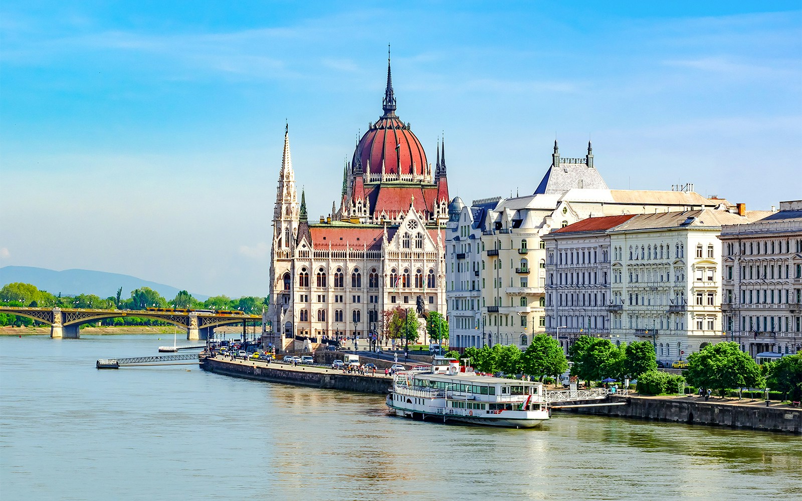 Hungarian Parliament Building along the Danube River in Budapest, showcasing its Gothic Revival architecture.