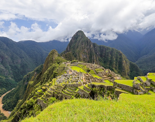 Machu Picchu ruins with Huayna Picchu mountain in the background, Peru.