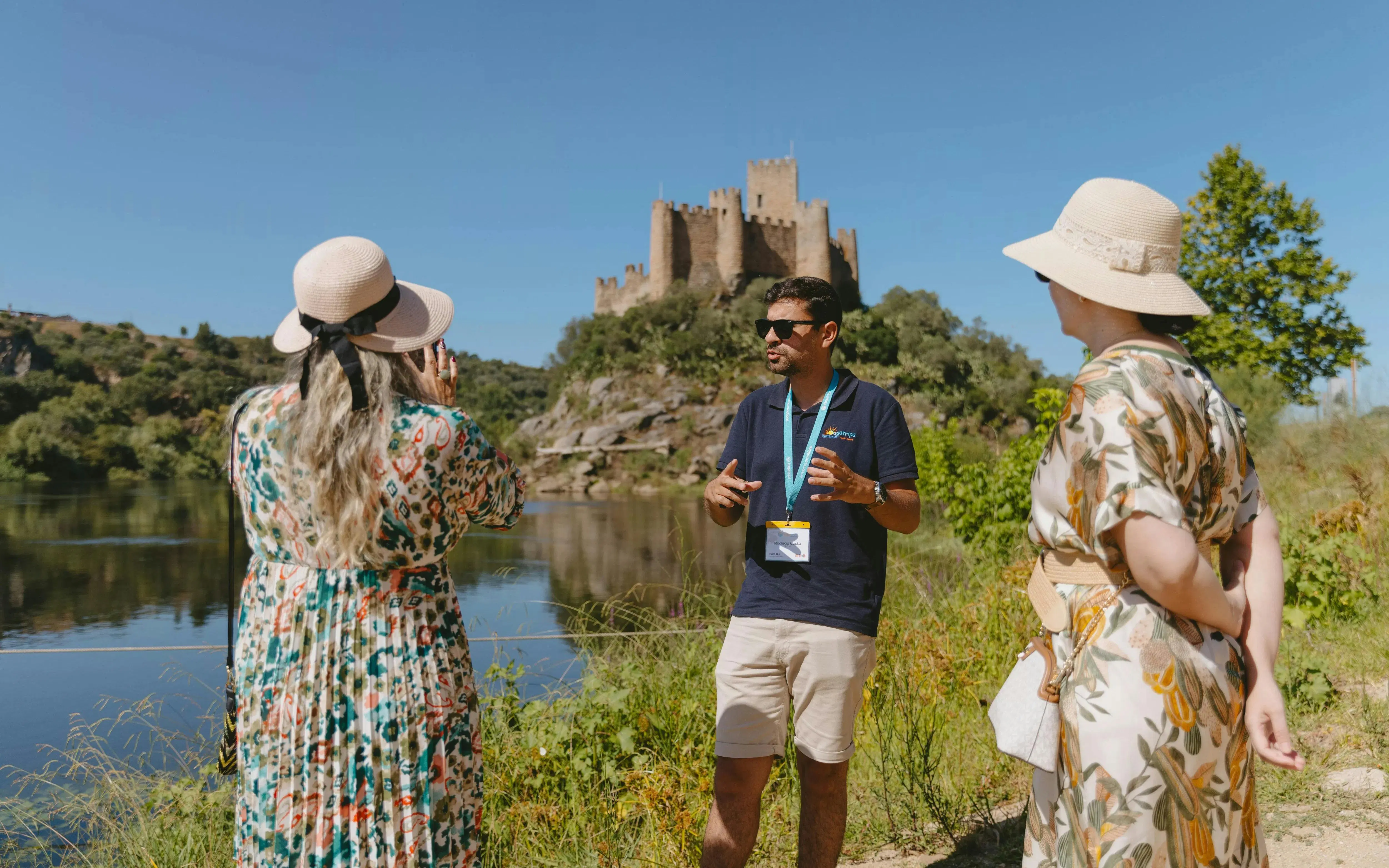 Tourist group with guide at Castle of Almourol, Tomar, Portugal.