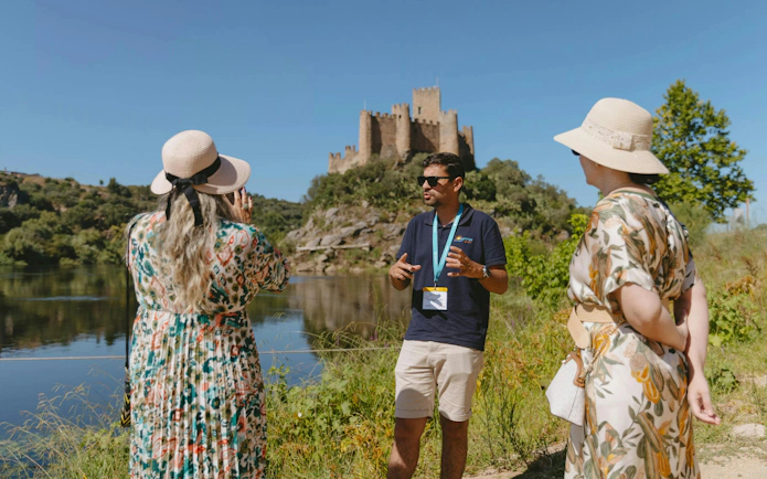 Tourist group with guide at Castle of Almourol, Tomar, Portugal.