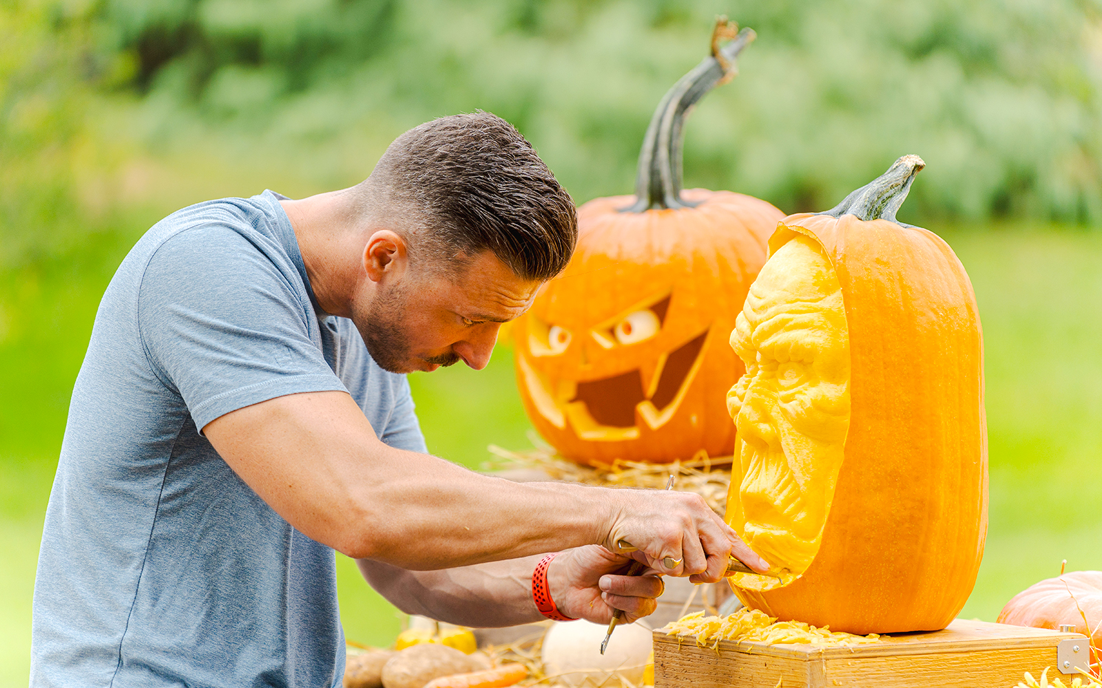 Pumpkin carving demonstration at New York Botanical Garden.