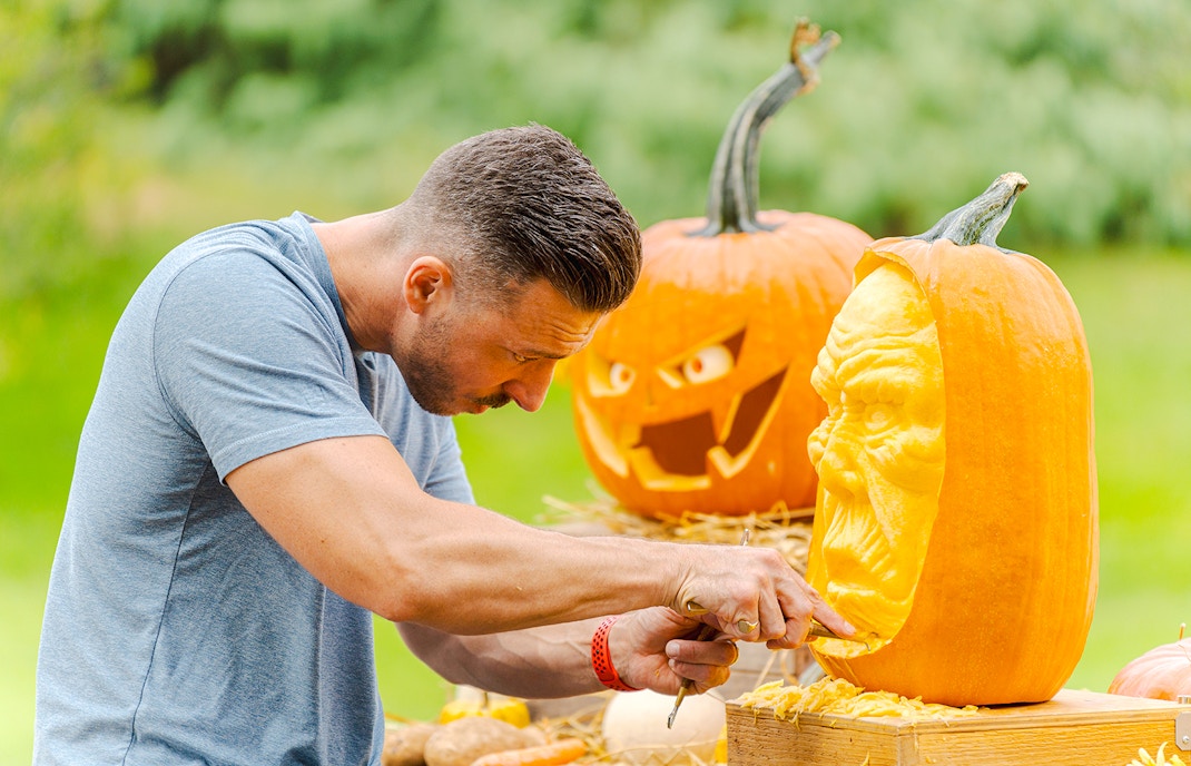 Pumpkin carving demonstration at New York Botanical Garden.