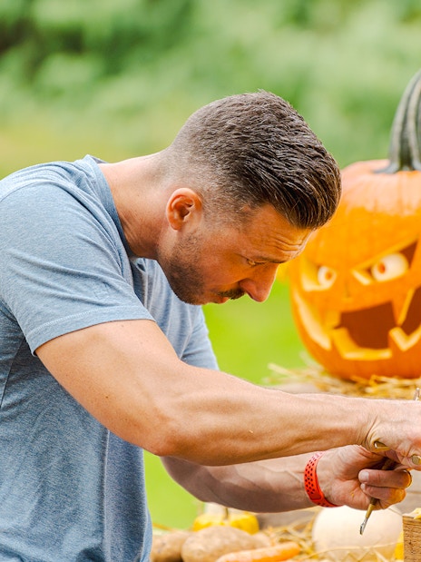 Pumpkin carving demonstration at New York Botanical Garden.