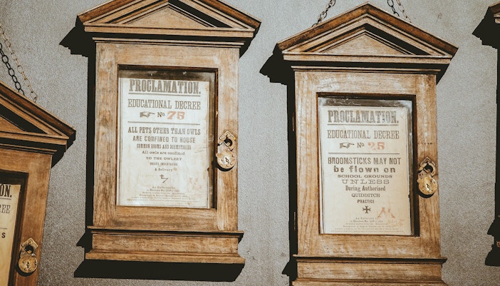Harry Potter props displayed in a themed exhibit in London.
