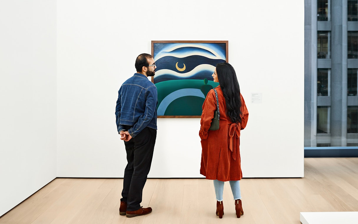 Visitors viewing artwork at the Museum of Modern Art, New York City.
