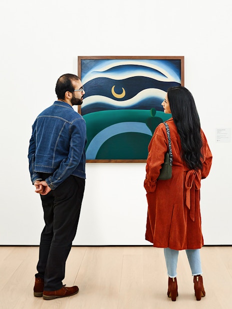 Visitors viewing artwork at the Museum of Modern Art, New York City.