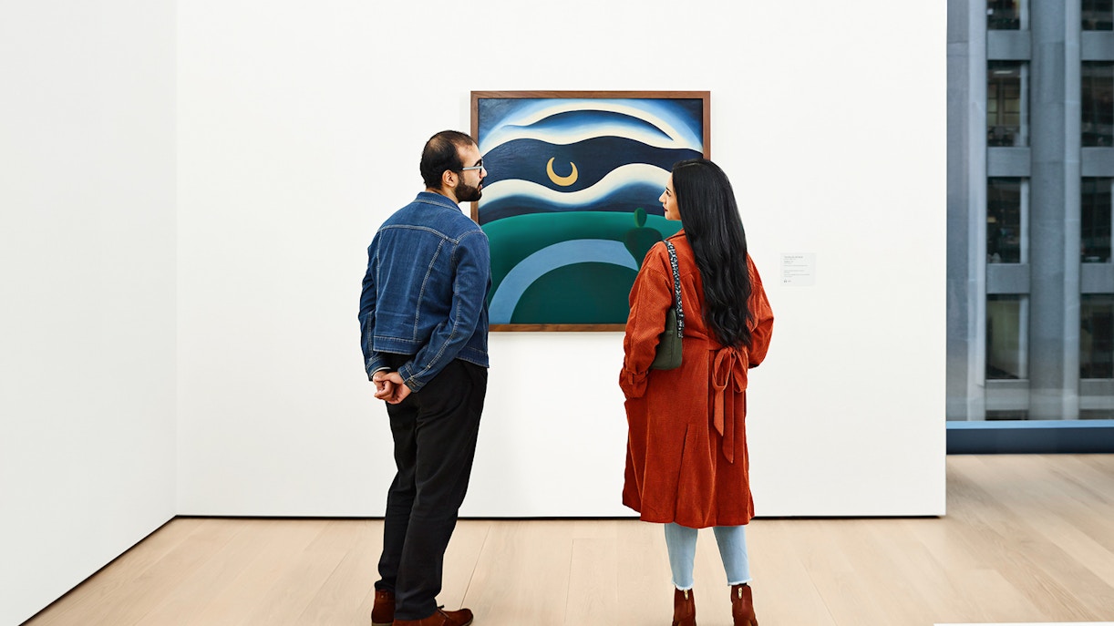 Visitors viewing artwork at the Museum of Modern Art, New York City.