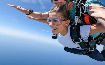 Tandem skydive over Shellharbour, Sydney at 15,000ft with ocean view.
