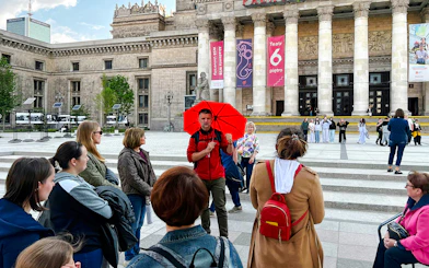 Tour group with guide at Palace of Culture and Science, Warsaw.