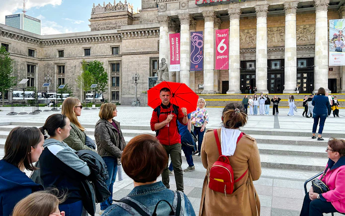 Tour group with guide at Palace of Culture and Science, Warsaw.
