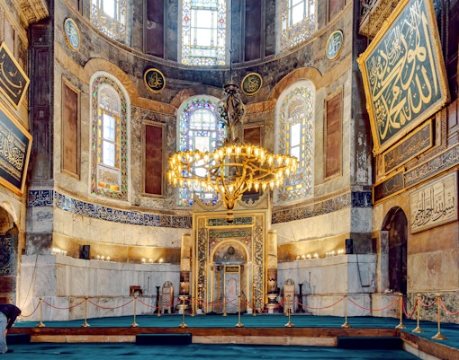 Hagia Sophia interior with ornate domes and arches, Istanbul, Turkey.