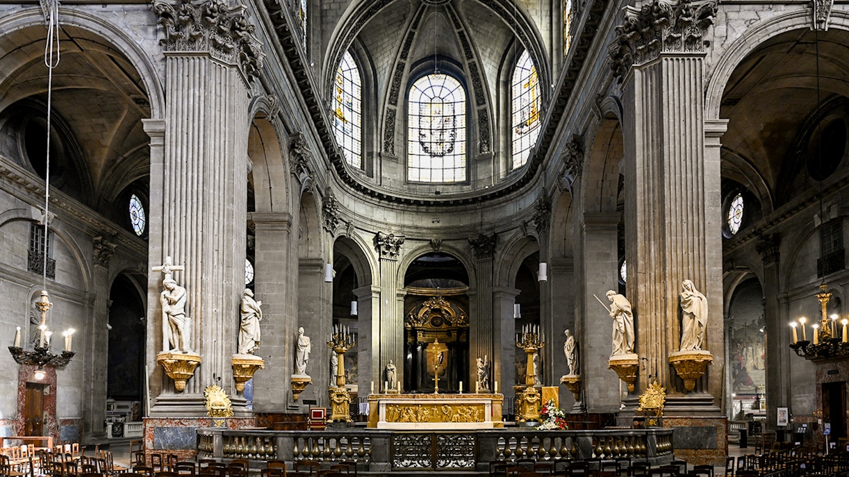 Eglise Saint-Sulpice facade with twin towers in Paris, France.