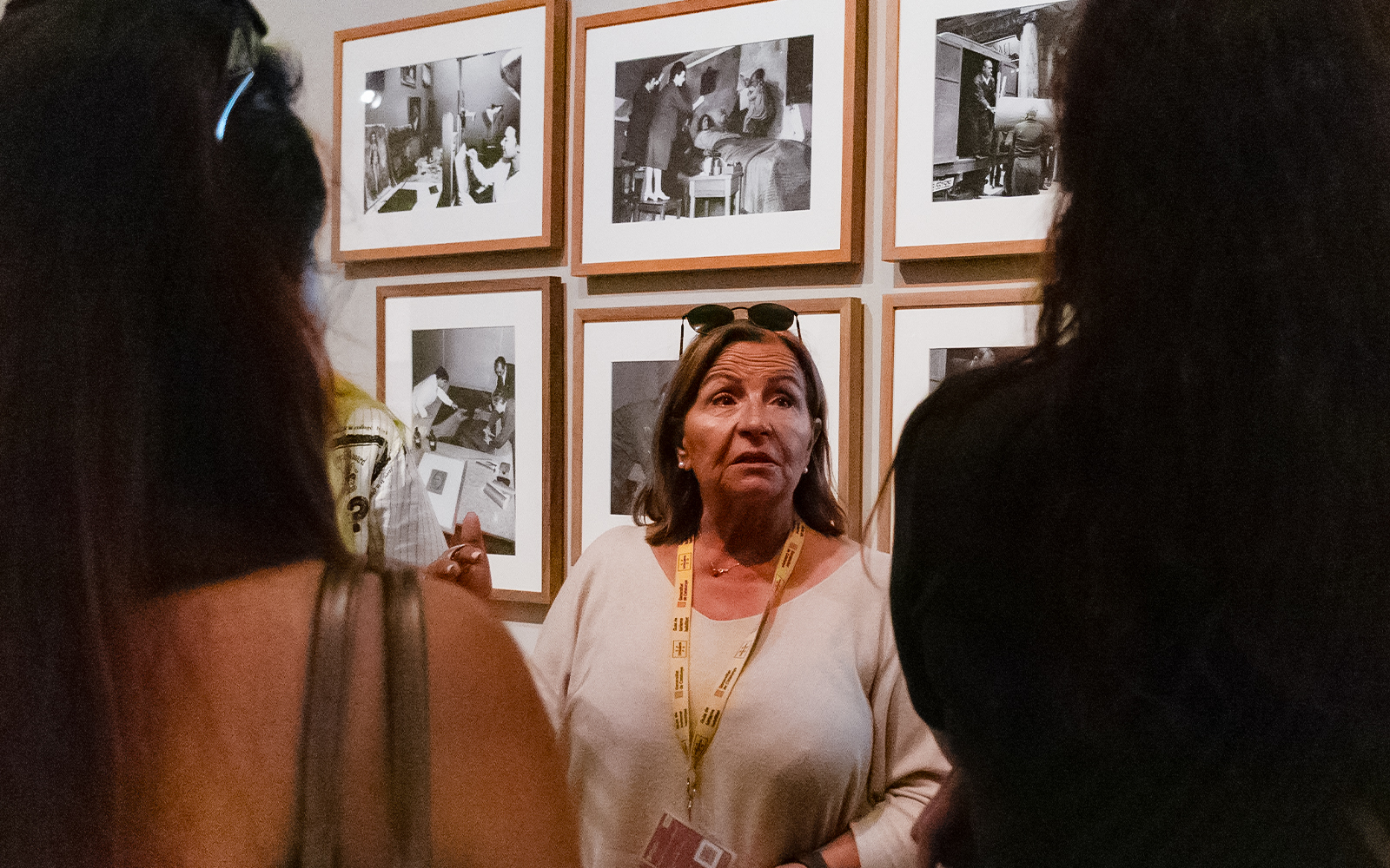Guide discussing artwork at Picasso Museum, Barcelona.