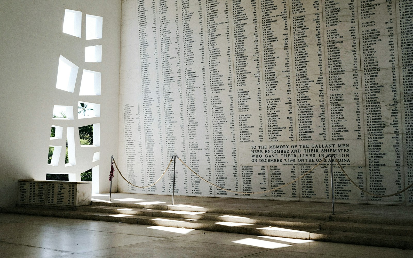 Memorial wall with names inside USS Arizona Memorial, Pearl Harbor.
