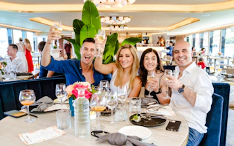 Guests enjoying drinks during Chandon Harbour Long Lunch onboard The Jackson.