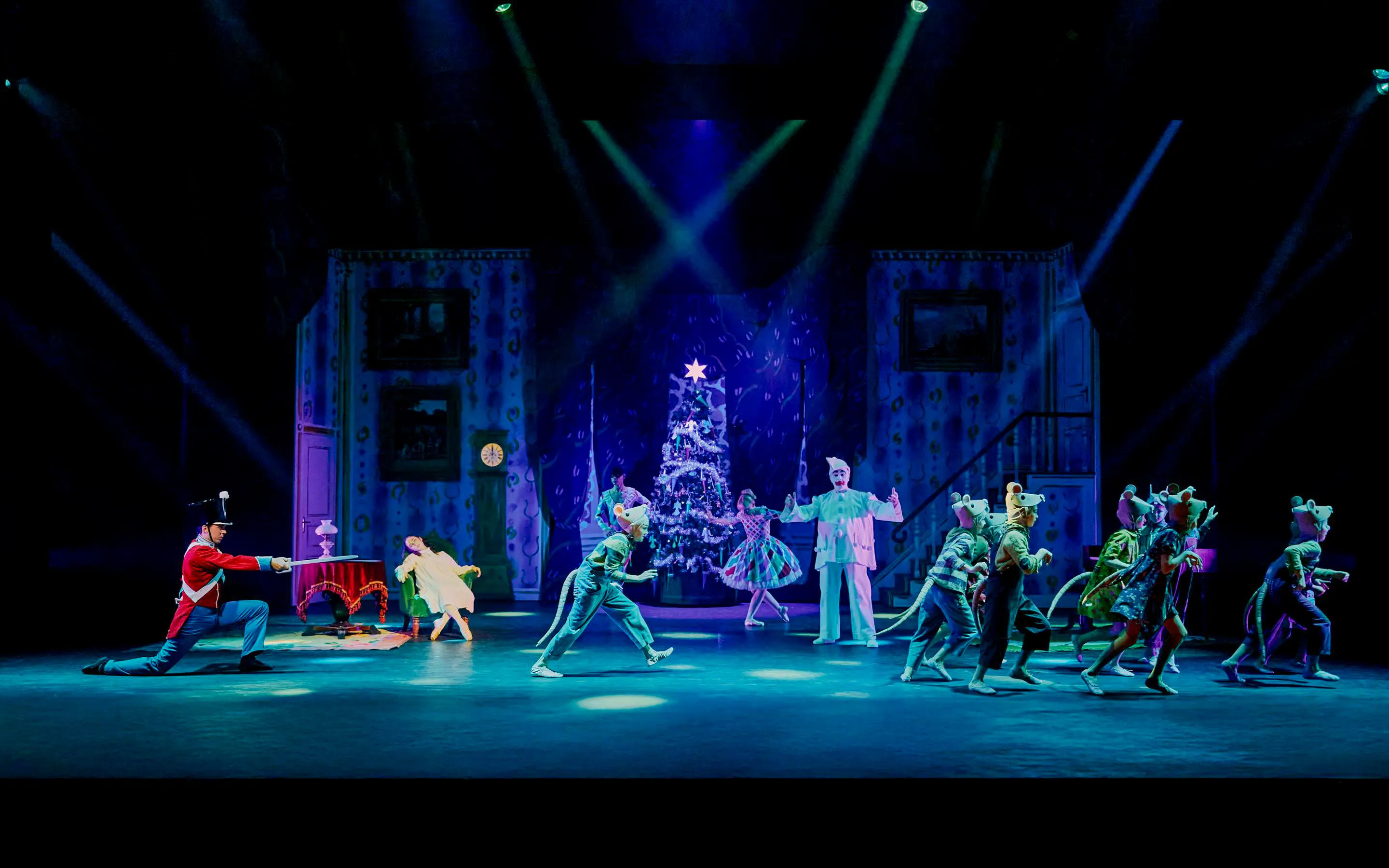 Nutcracker performance with dancers and Christmas tree at Tivoli Gardens.