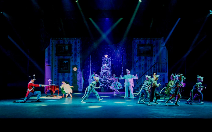 Nutcracker performance with dancers and Christmas tree at Tivoli Gardens.