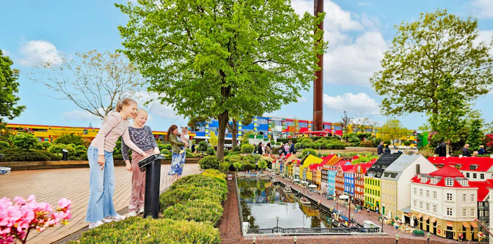 Children exploring LEGO miniature city at LEGOLAND® Billund.