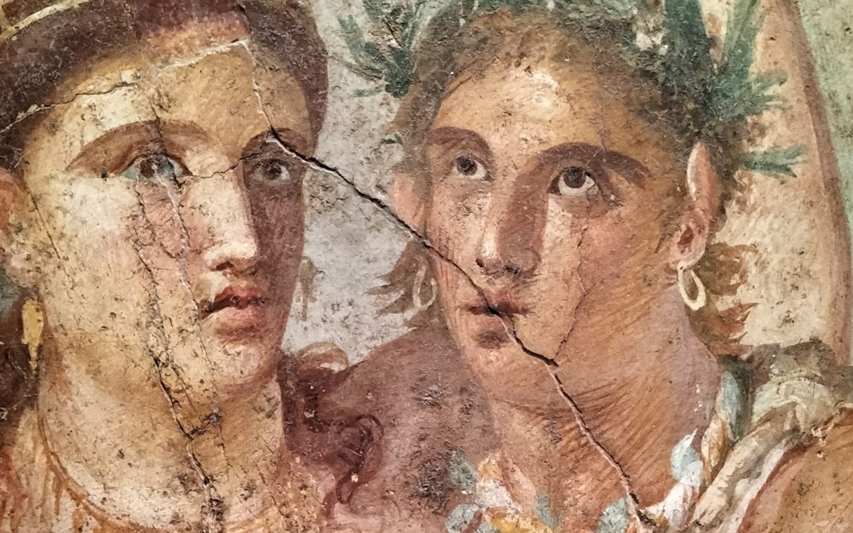 Ancient fresco of two figures from the secret room, National Archaeological Museum of Naples.