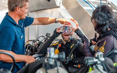 Tourists preparing for a dive on a Great Barrier Reef cruise.