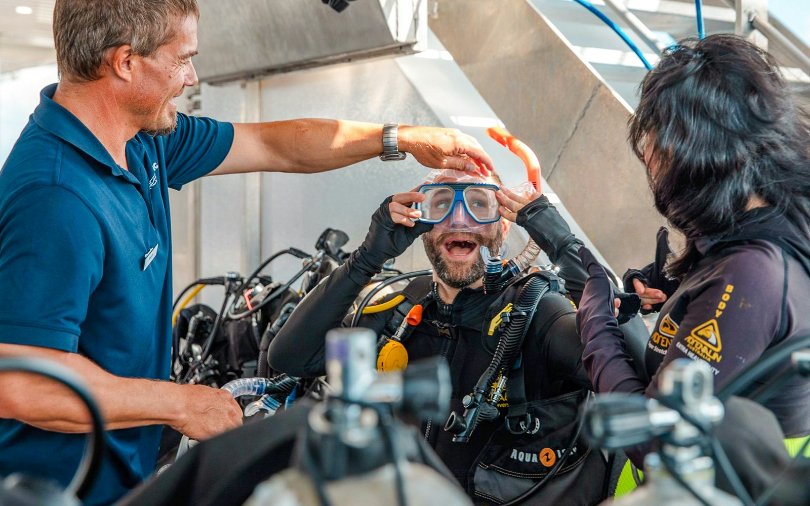 Tourists preparing for a dive on a Great Barrier Reef cruise.