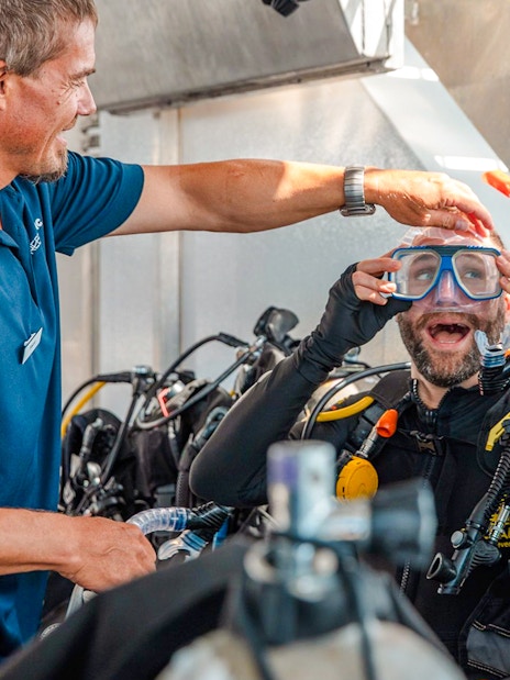 Tourists preparing for a dive on a Great Barrier Reef cruise.