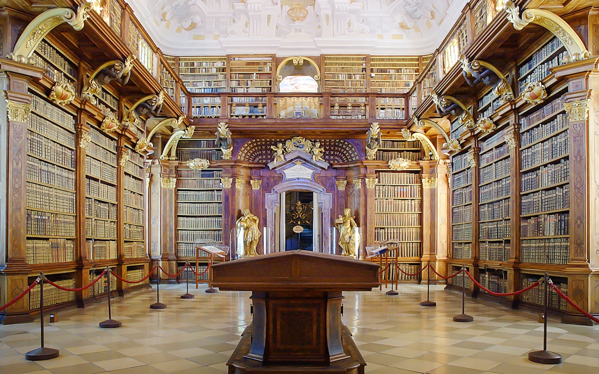 Melk Abbey library interior with ornate bookshelves, part of Wachau Day Trip.