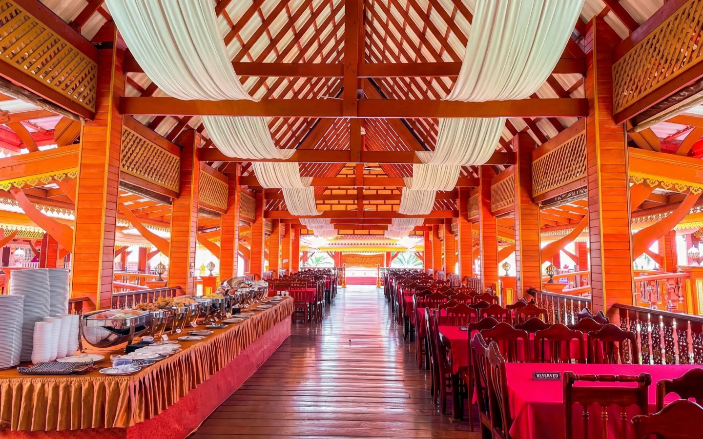 Dining area setup for James Bond Island & Phang Nga Bay day tour with buffet tables.