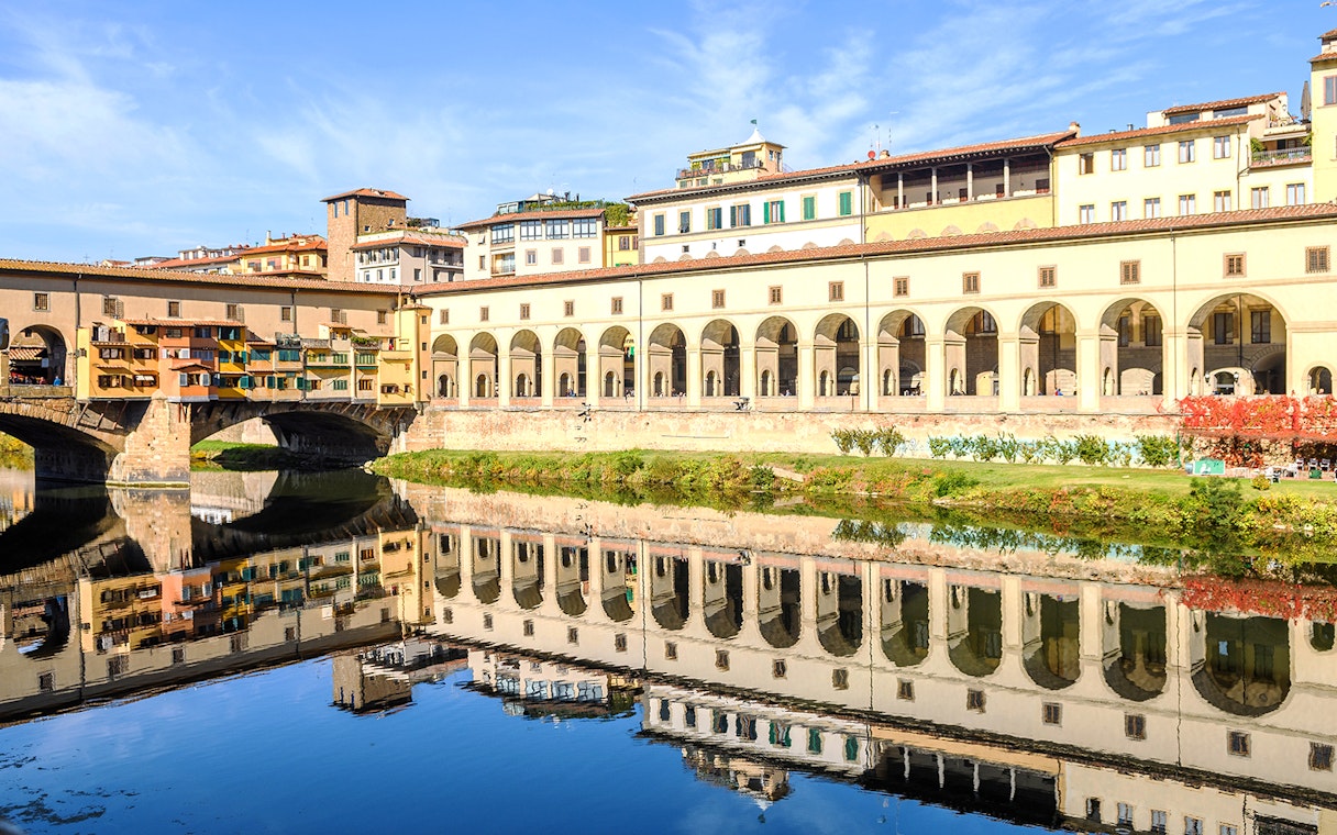 Ponte Vecchio and Uffizi Gallery along the Arno River in Florence, Italy.