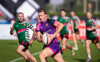 Rugby players in action at Emirates Dubai 7s tournament.