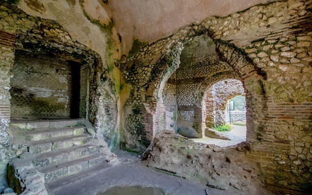 Ruins of Villa Jovis interior with stone arches on Capri Island.