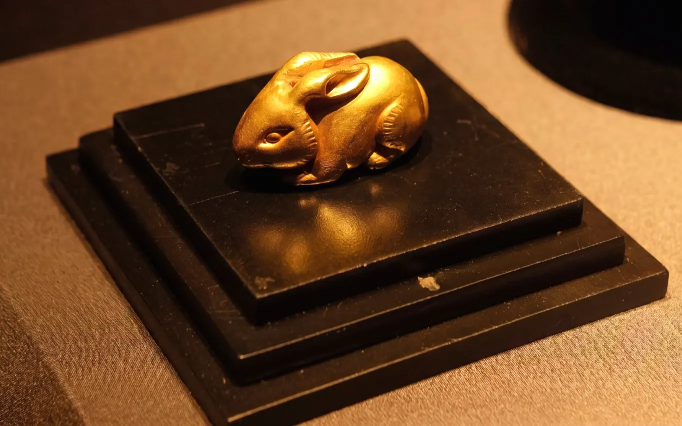 Gold rabbit statue on display at Shanghai Guanfu Museum.