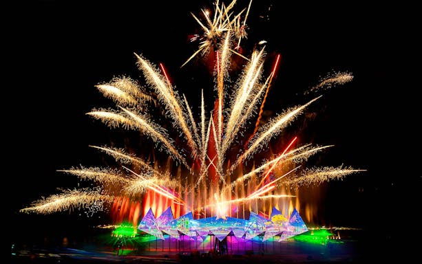 Fireworks display at Wings of Time exhibition, Sentosa Island, at night.